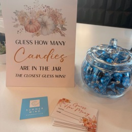 jar of candy with card next to it. 