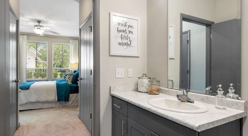 a bathroom with a large mirror