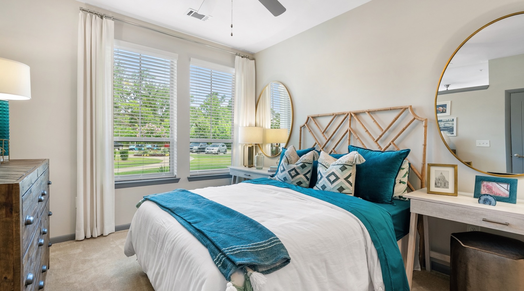 a bedroom with a large window