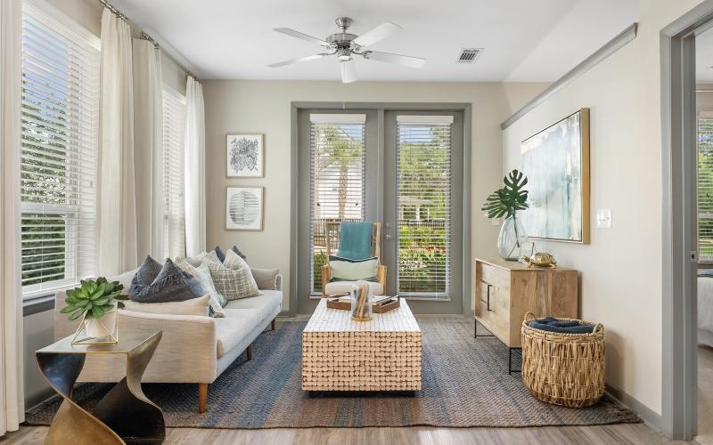 a living room with a couch and a table